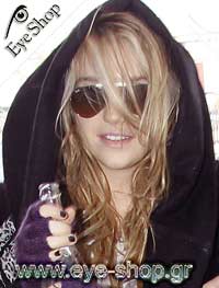 Kesha the famous singer wearing RayBan Aviator sunglasses