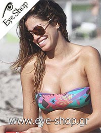 H Aida Yespica mis Venezouela 2002 wearing Chanel sunglasse.τις τελευταίες εβδομάδες ξημεροβραδιάζεται σε μια παραλία στο Miami και οι paparazzi έχουν στήσει γλέντι!