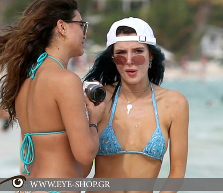 Bella Thorne με Rayban Round Flat