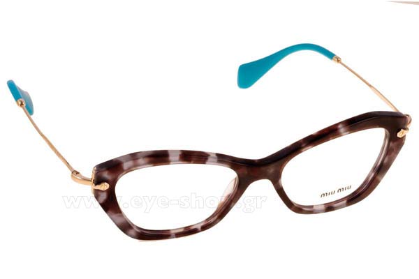 Dita Von Teesenμε τα γυαλιά ηλίου Miu Miu 04LV